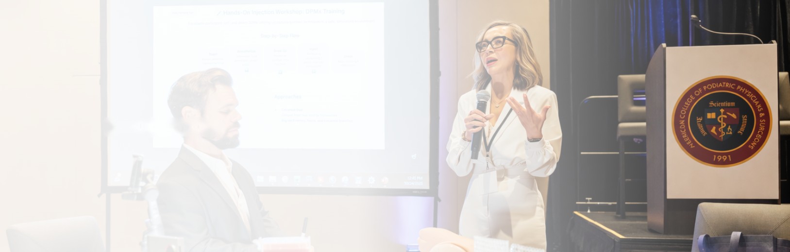 Presenter speaking at an APBFRM education session